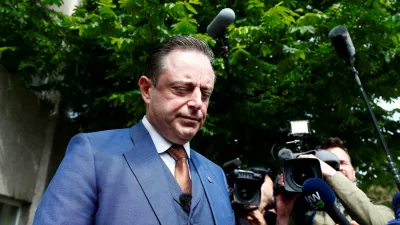 FILE PHOTO: Bart De Wever, President of Flemish nationalist party N-VA, talks to the media after casting his vote for the Belgian general and regional elections and for the European Parliament Elections in Antwerp, Belgium May 26, 2019. REUTERS/Francois Lenoir/File Photo