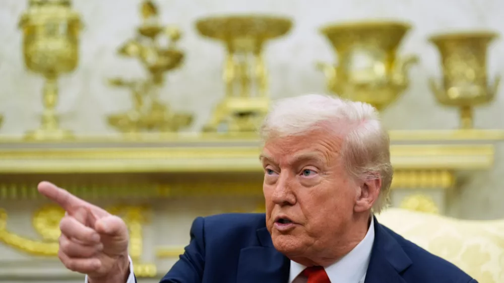 President Donald Trump calls on a reporter to ask a question during a meeting with Finland's President Alexander Stubb in the Oval Office at the White House, Thursday, Oct. 9, 2025, in Washington. (AP Photo/Alex Brandon)