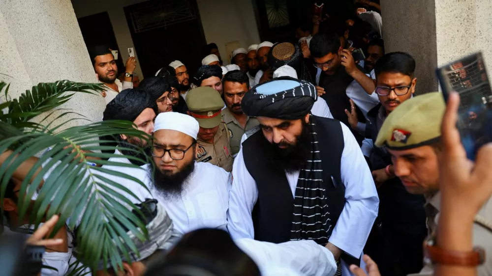 Taliban Foreign Minister Mawlawi Amir Khan Muttaqi exits a room at a guest house near the Darul Uloom Deoband, an Islamic seminary, in Deoband, Uttar Pradesh, India, October 11, 2025. REUTERS/Anushree Fadnavis