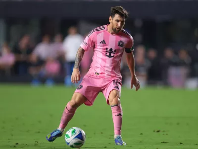 Oct 11, 2025; Fort Lauderdale, Florida, USA; Inter Miami CF forward Lionel Messi (10) dribbles the ball against Atlanta United during the second half at Chase Stadium. Mandatory Credit: Sam Navarro-Imagn Images
