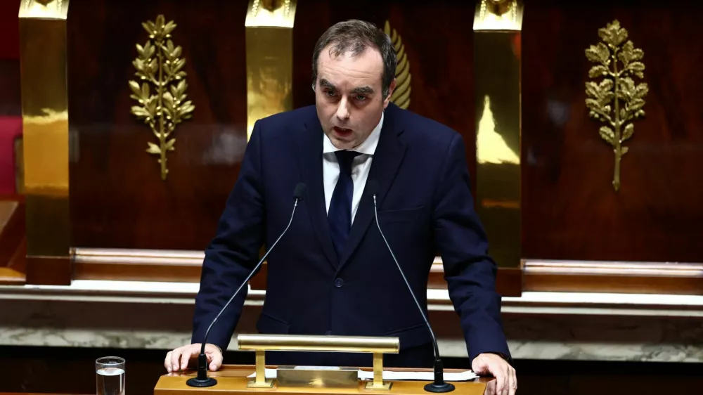 French Prime Minister Sebastien Lecornu delivers his first general policy speech in front of the parliament and the new government following by a debate at the National Assembly in Paris, France, October 14, 2025. REUTERS/Gonzalo Fuentes