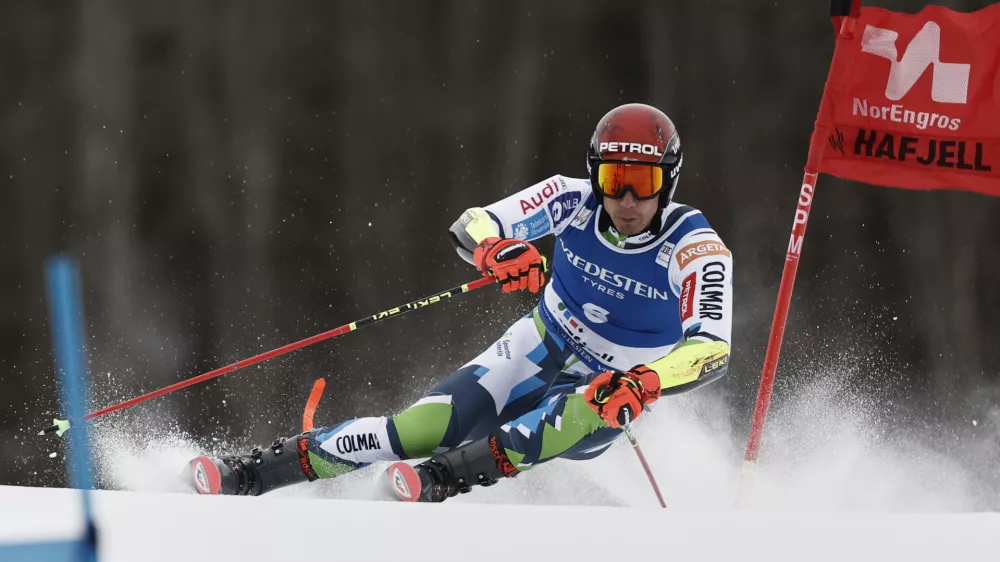 Slovenia's Zan Kranjec competes in an alpine ski, men's World Cup Giant Slalom, in Hafjell, Norway, Saturday, March 15, 2025. (AP Photo/Gabriele Facciotti)