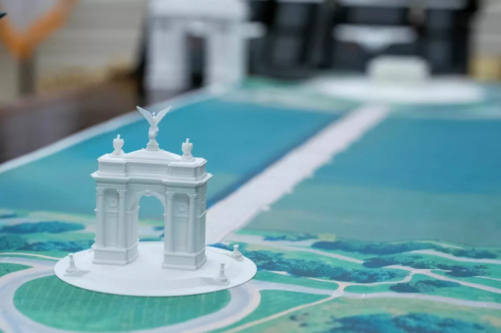 FILE PHOTO: A plan for an arch across from the Lincoln Memorial is seen on the Resolute Desk as US President Donald Trump meets with Finnish President Alexander Stubb and Prime Minister Petteri Orpo in the Oval Office of the White House Washington, D.C., U.S., October 9, 2025. REUTERS/Nathan Howard/File Photo