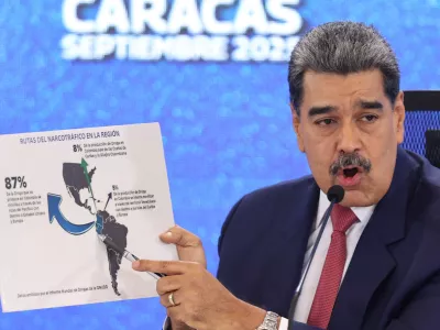 FILE - Venezuela's President Nicolas Maduro points at a map of the Americas during a new conference in Caracas, Venezuela, Sept 15, 2025. (AP Photo/Jesus Vargas), File