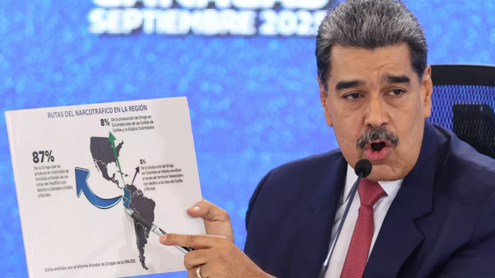 FILE - Venezuela's President Nicolas Maduro points at a map of the Americas during a new conference in Caracas, Venezuela, Sept 15, 2025. (AP Photo/Jesus Vargas), File
