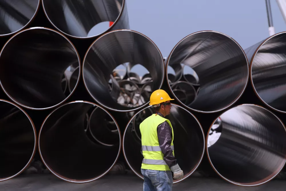 ﻿Some of the first pipes to arrive for the Trans-Adriatic Pipeline (TAP) project in Durres, Albania, Monday, April 18, 2016. Albania is part of the 878-kilometer (545 miles) TAP project that will bring gas from the Shah Deniz II field in Azerbaijan, across Turkey, Greece, Albania and undersea into southern Italy. (AP Photo/Hektor Pustina)