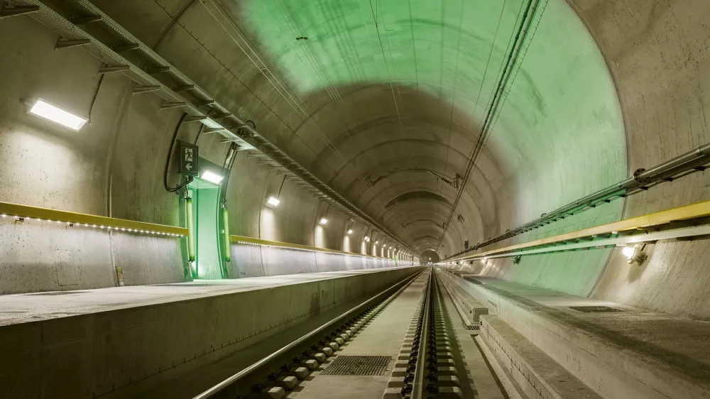 ﻿In this image released on Monday, Apr. 4, 2016, the tracks of the Gotthard Base Tunnel point to the future of the trans-Alpine railway. The Gotthard Base Tunnel, the longest train tunnel in the world, enters into service on 11 December 2016. Prior to this, the record-breaking construction will be more accessible than ever, but only for a limited period. From 2 August 2016, passengers may descend into the once-in-a-century construction on exclusive tunnel rides - disembarkation in the depths of the mountain included. The special Gottardino train only runs until 27 November 2016 and the number of tickets is limited. For more information visit www.apassignments.com/newsaktuell. (Swiss Travel System AG/obs via AP Images)
