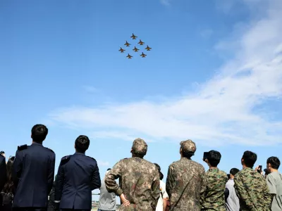 FILE PHOTO: The South Korean Air Force Black Eagles aerobatic team perform during Seoul International Aerospace & Defense Exhibition (ADEX) in Seongnam, South Korea, October 17, 2025.  REUTERS/Kim Hong-Ji/File Photo