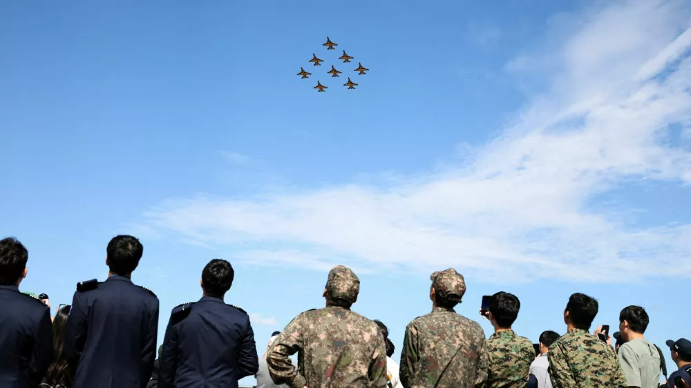 FILE PHOTO: The South Korean Air Force Black Eagles aerobatic team perform during Seoul International Aerospace & Defense Exhibition (ADEX) in Seongnam, South Korea, October 17, 2025.  REUTERS/Kim Hong-Ji/File Photo
