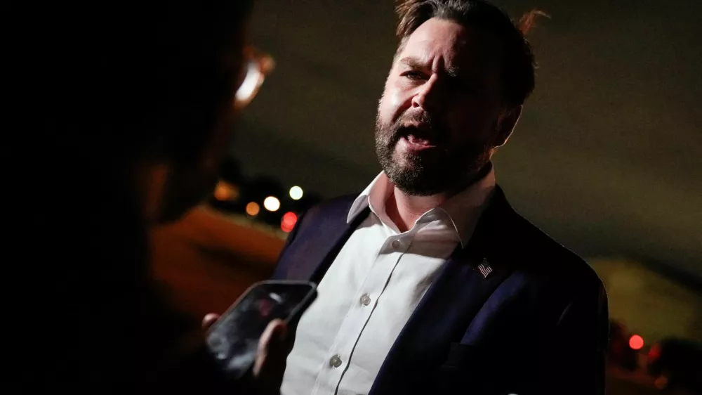 U.S. Vice President JD Vance speaks with reporters upon his arrival at Joint Base Andrews, Maryland, U.S., October 19, 2025.   Oliver Contreras/Pool via REUTERS