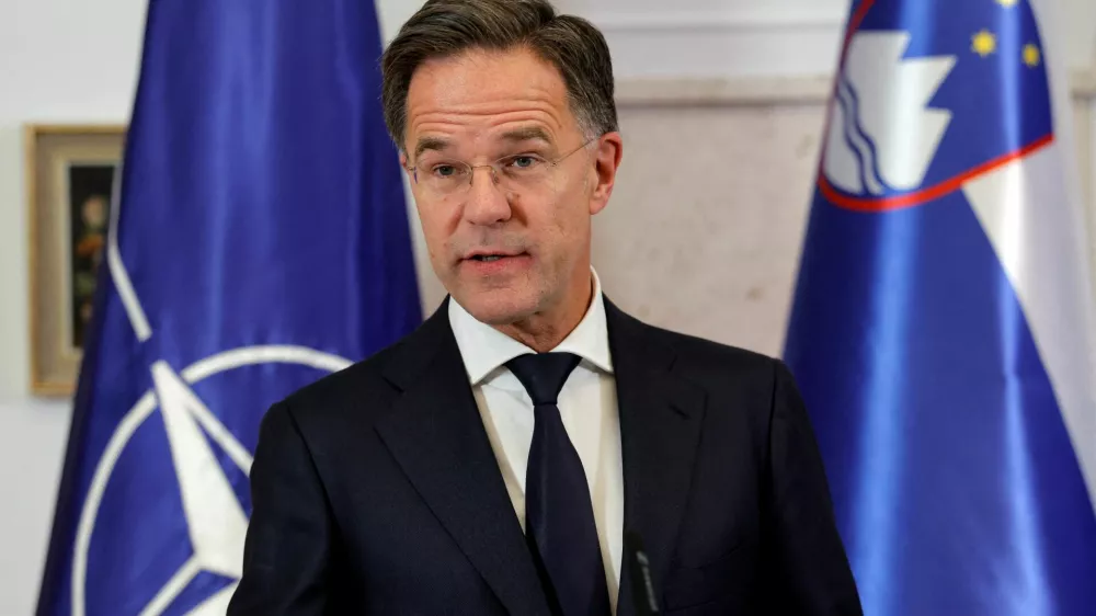 FILE PHOTO: NATO Secretary General Mark Rutte talks at the press conference during his visit in Slovenia, in Brdo pri Kranju, Slovenia, October 13, 2025. REUTERS/Borut Zivulovic/File Photo