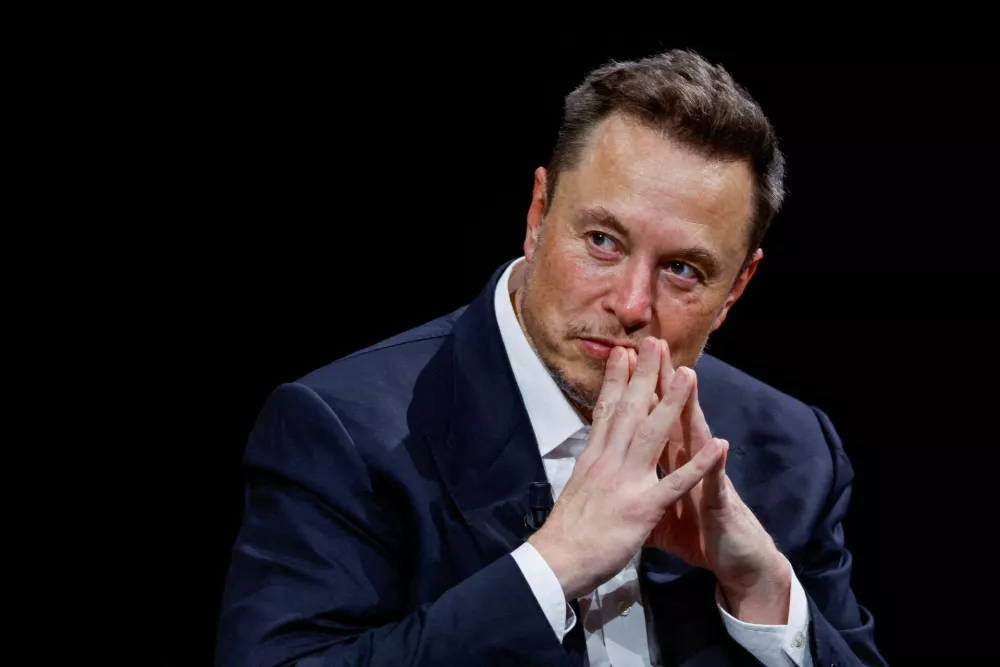 Elon Musk, Chief Executive Officer of SpaceX and Tesla, gestures as he attends the Viva Technology conference dedicated to innovation and startups at the Porte de Versailles exhibition centre in Paris, France, June 16, 2023. REUTERS/Gonzalo Fuentes/File Photo