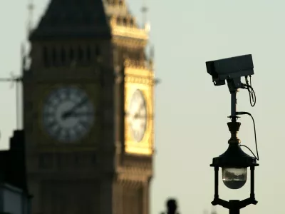 A CCTV (Closed Circuit Television) camera is seen with the backdrop of Big Ben in central London, Thursday, Nov. 2, 2006. Demand is growing for a debate on the number of CCTV cameras in Britain as figures reveal that 20% of the world's spy cameras are in the UK - one for every 12 people. It makes Britons the most spied on people anywhere on the globe. British Information commissioner Richard Thomas has warned the UK is in danger of turning into a Big Brother society. He says more and more personal data is being collected on all of us by the state and big business. (AP Photo / Akira Suemori)