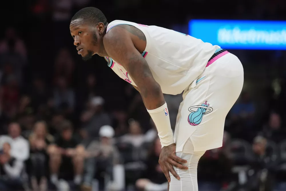 FILE - Miami Heat guard Terry Rozier (2) looks up court during the last seconds of the second half of an NBA basketball game against the Chicago Bulls, Saturday, March 8, 2025, in Miami. (AP Photo/Marta Lavandier, File)