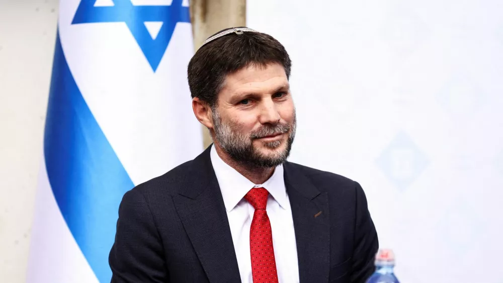 FILE PHOTO: Bezalel Smotrich speaks at a handing over ceremony after he took office as the new Israeli Finance Minister in Jerusalem January 1, 2023. REUTERS/Ronen Zvulun/File Photo