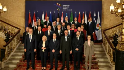 Leaders and delegates pose for a family photo: (L-R top row) CEFTA's Pranvera Kastrati, European Investment Bank's Robert De Groot, OECD's Karim Dahou, Regional Cooperation Council's Amer Kapetanovic, Regional Youth Cooperation Office's Valdimir Obradovic, Transparency International's Ivana Korajlic, World Bank's Christopher Sheldon, (L-R second second row) OSCE Secretary General Feridun H. Sinirlioglu, Poland's Deputy Foreign Minister Henryka Moscicka-Dendys, Greece's Foreign Minister Georgios Gerapetritis, French Europe Minister Benjamin Haddad, Slovenia State Secretary Neva Grasic, EBRD Secretary General Odile Renaud-Basso (L-R third row) Italy's Foreign Minister Antonio Tajani, Kosovo's Prime Minister Albin Kurti, Bulgaria's Prime Minister Rossen Jeliazkov, Croatia's Prime Minister Andrej Plenkovic, North Macedonia's Prime Minister Hristijan Mickoski, Austria's Chancellor Christian Stocker (L-R front row) Albanian Prime Minister Edi Rama, Chairwoman of the Council of Ministers of Bosnia and Herzegovina Borjana Kristo, Britain's Prime Minister Keir Starmer, German Chancellor Friedrich Merz, Montenegro's Prime Minister Milojko Spajic and EU foreign policy chief Kaja Kallas during the Western Balkans Summit in central London, Britain, October 22, 2025.   Chris J Ratcliffe/Pool via REUTERS