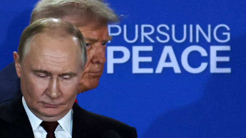 FILE PHOTO: U.S. President Donald Trump and Russian President Vladimir Putin hold a press conference following their meeting to negotiate an end to the war in Ukraine, at Joint Base Elmendorf-Richardson in Anchorage, Alaska, U.S., August 15, 2025. REUTERS/Jeenah Moon/File Photo