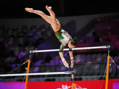 Kaylia Nemour of Algeria competes in the women's uneven bars final during the 53rd Artistic Gymnastics World Championships in Jakarta, Indonesia, Friday, Oct. 24, 2025. (AP Photo/Achmad Ibrahim)