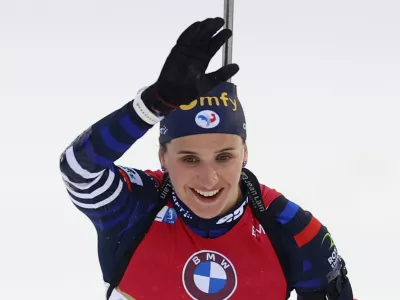 Biathlon - Biathlon World Championships - Nove Mesto Na Morave, Czech Republic - February 11, 2024 France's Julia Simon celebrates after winning the women's 10 km Pursuit REUTERS/David W Cerny