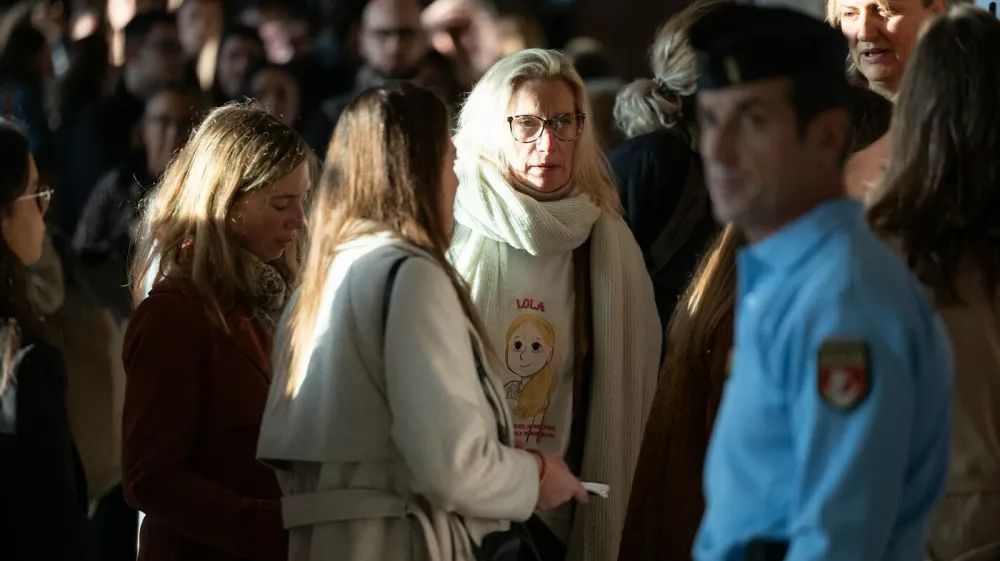 Delphine Daviet, mother of Lola, accompagnied by relatives, arrives at the Paris Assize Court for the trial of Dahbia Benkired, accused of raping, torturing, and killing Lola Daviet, a 12-year-old girl, in 2022, on October 17, 2025.,Image: 1046088007, License: Rights-managed, Restrictions:, Model Release: no