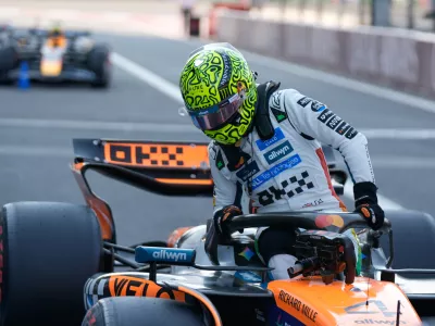 McLaren driver Lando Norris of Britain, gets out of his car after clocking the fastest time during the qualifying session for Formula One Mexico Grand Prix auto race at the Hermanos Rodriguez race track in Mexico City, Saturday, Oct. 25, 2025. (AP Photo/Fernando Llano)
