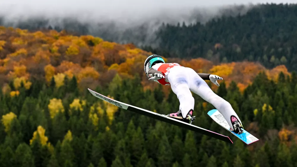 Slovenia's Nika Prevc competes in the ski jumping event, Saturday, Oct. 25,2 05, in Klingenthal, Germany. (Hendrik Schmidt/dpa via AP)