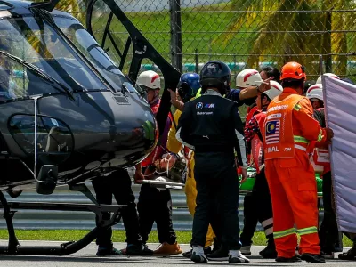 SEPANG, SGR - OCTOBER 26: Noah Dettwiler of Switzerland and CIP Green Power is taken by helicopter to hospital after a crash with Jose Antonio Rueda of Spain and Red Bull KTM Ajo during sighting lap ahead Moto3 race of the Petronas Grand Prix of Malaysia on October 26, 2025 held at Sepang International Circuit in Sepang, Malaysia.(Photo by Hazrin Yeob Men Shah/Icon Sportswire) (Icon Sportswire via AP Images)