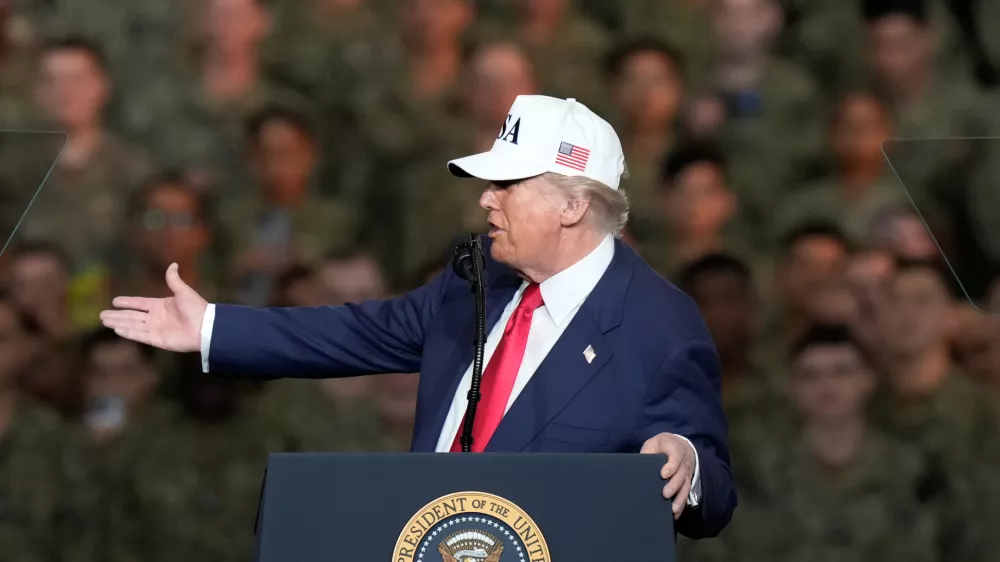 U.S. President Donald Trump speaks to the soldiers and servicemen during his visit to the USS George Washington at the U.S. Navy's Yokosuka base in Yokosuka, south of Tokyo, Tuesday, Oct. 28, 2025. (AP Photo/Eugene Hoshiko)