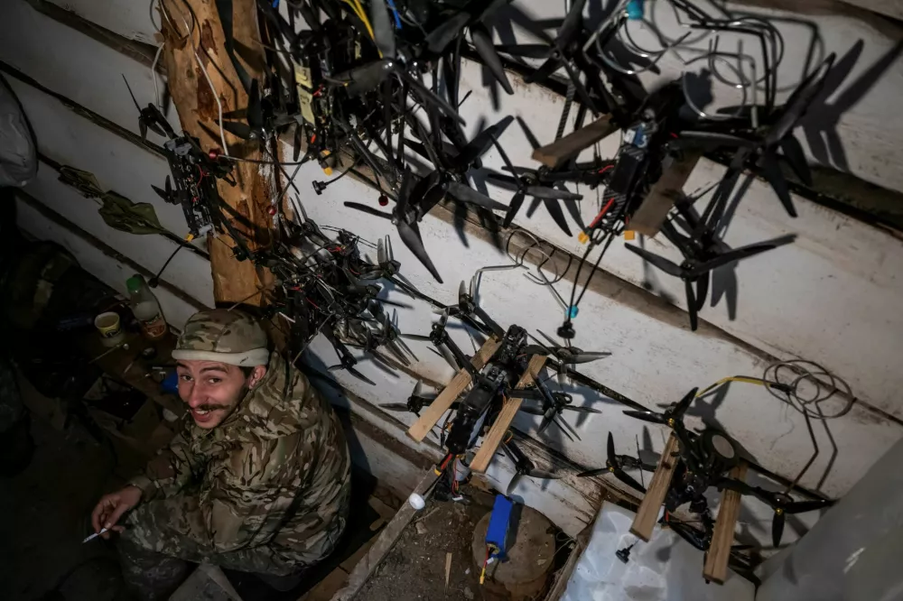 A serviceman, who operates first-person view (FPV) drones, of Da Vinci Wolves Separate Mechanized Battalion, named after Dmytro Kotsiubailo, of the 59th mechanized brigade of the Ukrainian Armed Forces, poses for a picture at his position in a front line, amid Russia's attack on Ukraine, near the town of Pokrovsk in Donetsk region, Ukraine October 20, 2024. REUTERS/Viacheslav Ratynskyi