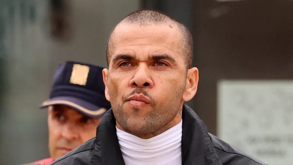 FILE PHOTO: Soccer Football - Dani Alves Release From Prison - Brians 2 Prison, Barcelona, Spain - March 25, 2024 Brazilian soccer player Dani Alves leaves the Brians 2 prison on bail while he appeals his rape conviction REUTERS/Nacho Doce/File Photo