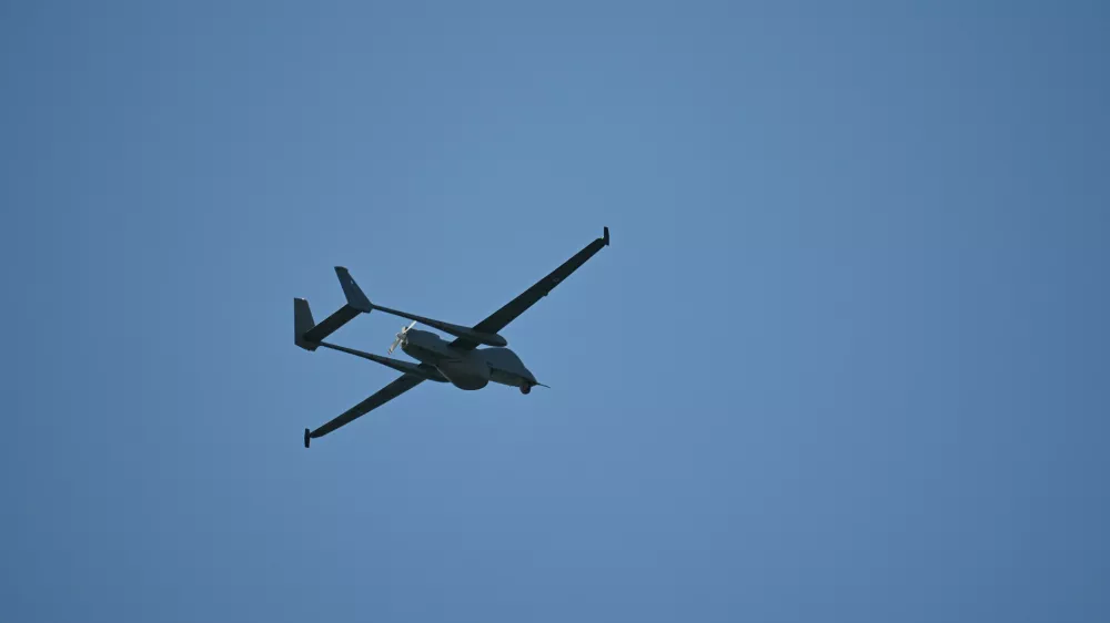 The IAI Heron drone manufactured in Israel, flies during the annual military parade to mark Ochi Day, commemorating Greece's defiance of Fascist Italy that forced it to enter World War II., in Thessaloniki, northern Greece, Tuesday, Oct. 28, 2025. (AP Photo/Giannis Papanikos)