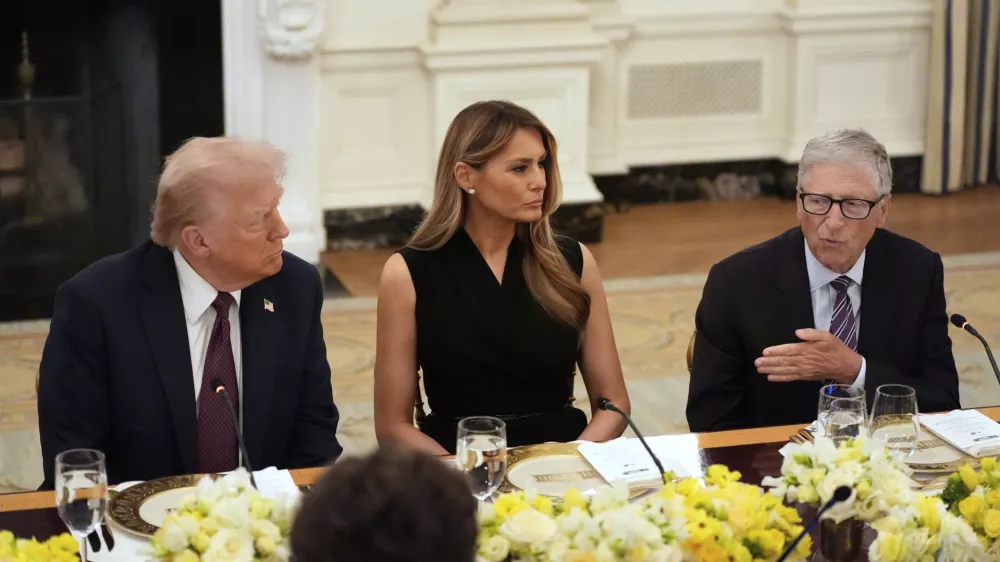 Microsoft's Bill Gates speaks at a dinner with President Donald Trump and first lady Melania Trump in the State Dinning Room of the White House, Thursday, Sept. 4, 2025, in Washington. (AP Photo/Alex Brandon)