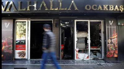 A man looks as he walks past a demolished Turkish owned restaurant in downtown, after a man was stabbed and wounded in a late-night incident in Podgorica, Montenegro, October 27, 2025. REUTERS/Stevo Vasiljevic