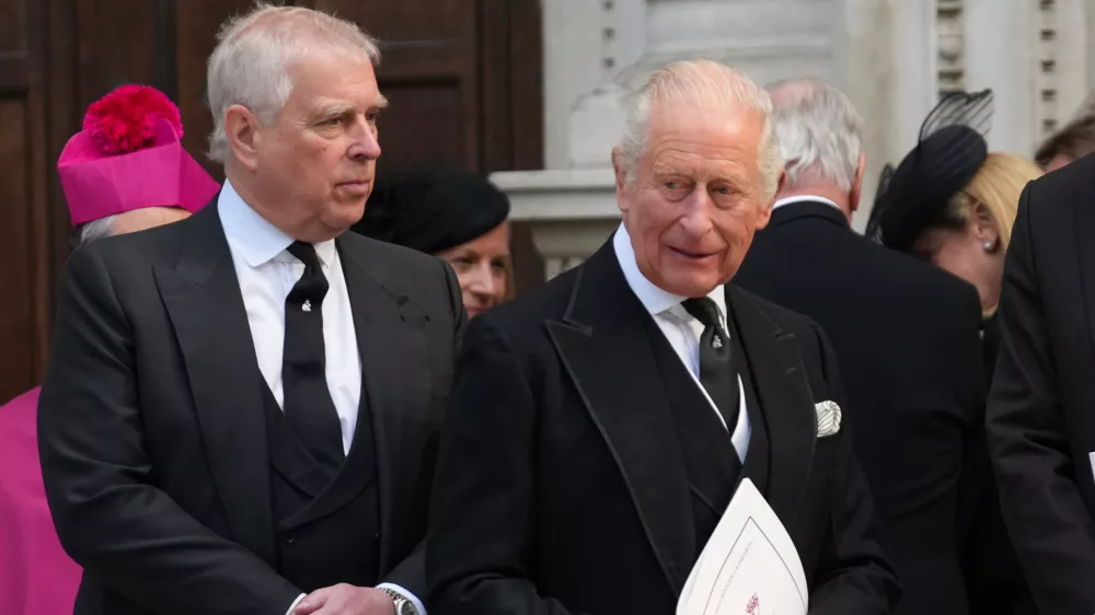 FILE - Britain's Prince Andrew, left, and Britain's King Charles III leave after the Requiem Mass service for the Duchess of Kent at Westminster Cathedral in London, Tuesday, Sept. 16, 2025. (AP Photo/Joanna Chan, File)