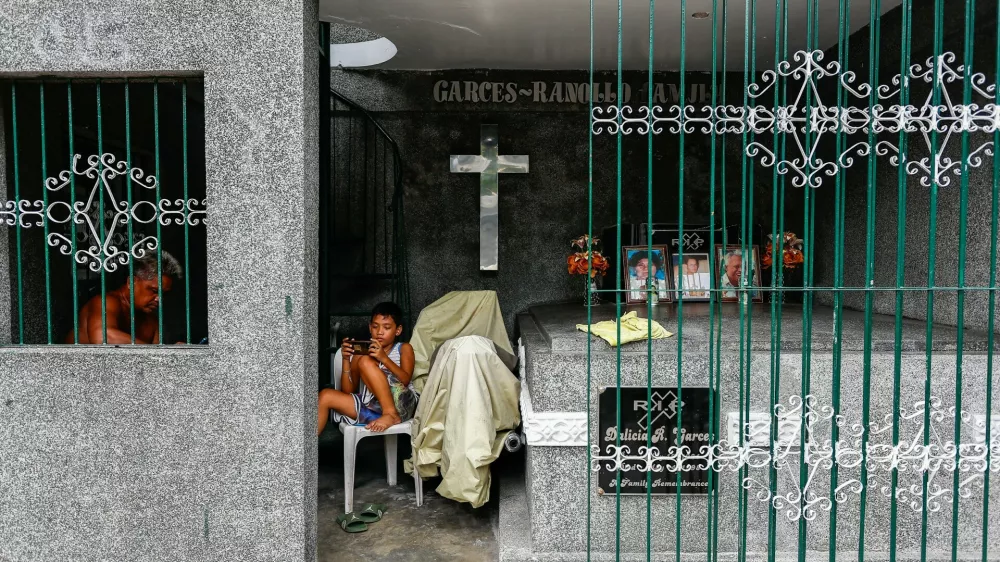 Prizor s pokopali&scaron;ča v Manili / Foto: Profimedia / Foto: Profimedia