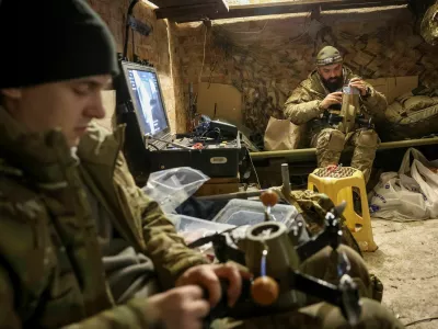 Servicemen from the SQUADRON interceptor unit of the 3rd Army Corps of the Ukrainian Armed Forces prepare a Ukrainian drone-interceptor Sting for a flight at their front line position, amid Russia's attack on Ukraine, near the frontline in eastern Ukraine, October 30, 2025. REUTERS/Anatolii Stepanov
