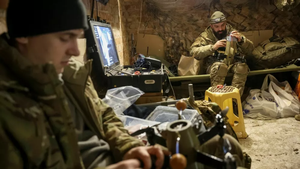 Servicemen from the SQUADRON interceptor unit of the 3rd Army Corps of the Ukrainian Armed Forces prepare a Ukrainian drone-interceptor Sting for a flight at their front line position, amid Russia's attack on Ukraine, near the frontline in eastern Ukraine, October 30, 2025. REUTERS/Anatolii Stepanov