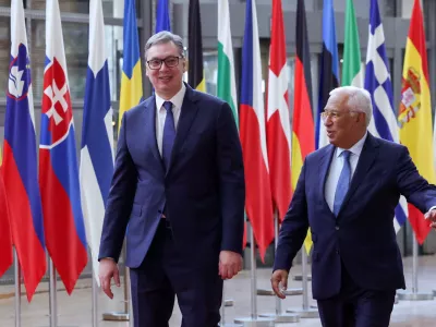 Serbian President Aleksandar Vucic walks European Council President Antonio Costa, in Brussels, Belgium November 4, 2025. REUTERS/Yves Herman
