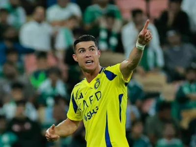 Soccer Football - Saudi Pro League - Al Ahli v Al Nassr - King Abdullah Sports City, Jeddah, Saudi Arabia - February 13, 2025 Al Nassr's Cristiano Ronaldo reacts after being substituted REUTERS/Stringer