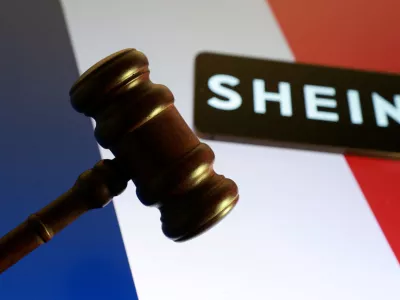 Illustration of Shein logo, court gavel and French flag taken November 5, 2025. REUTERS/Dado Ruvic/Illustration
