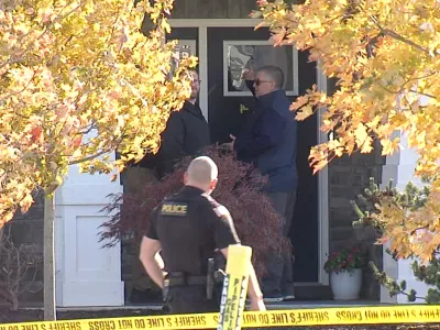 CORRECTS LAST NAME - In this image from video provided by WRTV, investigators work at the site of the fatal shooting of house cleaner Maria Florinda Rios Perez who went to the wrong address in Whitestown, Ind., on Wednesday, Nov. 5, 2025. (WRTV via AP)