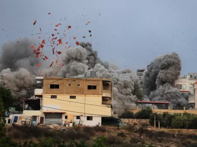 Smoke rises following an Israeli airstrike in the village of Teir Debba, southern Lebanon, Nov. 6, 2025. (AP Photo/Mohammad Zaatari)