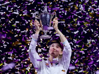 Tennis - WTA Finals - Riyadh - King Saud University Indoor Arena, Riyadh, Saudi Arabia - November 8, 2025 Kazakhstan's Elena Rybakina celebrates with the trophy after winning the final match against Belarus' Aryna Sabalenka REUTERS/Stephanie Lecocq   TPX IMAGES OF THE DAY