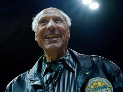 FILE - Former Seattle SuperSonics coach and player Lenny Wilkens acknowledges the crowd during the second half of a preseason NBA basketball game between the Los Angeles Clippers and the Utah Jazz, Oct. 10, 2023, in Seattle. (AP Photo/Lindsey Wasson, File)