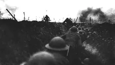 TO MOVE WITH FEATURE BC-MILLENNIUM-CENTURY-WAR - British soldiers wait in the trenches on the Western Front during the First World War as they prepare to make their way 'over the top' to face the enemy. If there is a physical frontier between the 19th and 20th centuries, it surely runs through the haunted trenches and artillery craters scarring the battlefields of World War One.CLH/ - RTRUBNS