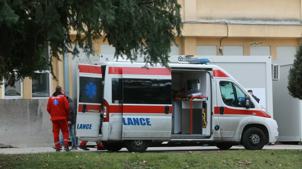BELGRADE, SERBIA - DECEMBER 24: Health care workers are seen near an ambulance in Belgrade, Serbia on December 24, 2020. Serbia launched a free coronavirus vaccination campaign starting from nursing homes and also a representative of the government to set an example showing that the vaccine is valid. The first batch of the BioNTech/Pfizer vaccine, comprising 4,800 doses. Milos Miskov / Anadolu Agency,Image: 578446255, License: Rights-managed, Restrictions:, Model Release: no