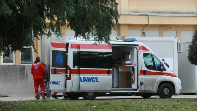 BELGRADE, SERBIA - DECEMBER 24: Health care workers are seen near an ambulance in Belgrade, Serbia on December 24, 2020. Serbia launched a free coronavirus vaccination campaign starting from nursing homes and also a representative of the government to set an example showing that the vaccine is valid. The first batch of the BioNTech/Pfizer vaccine, comprising 4,800 doses. Milos Miskov / Anadolu Agency,Image: 578446255, License: Rights-managed, Restrictions:, Model Release: no