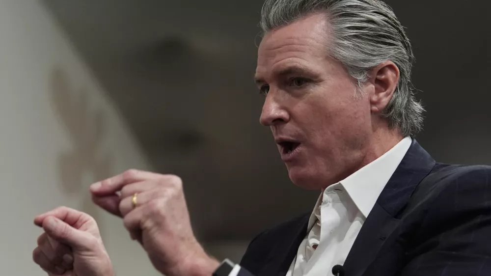 California Gov. Gavin Newsom speaks during an interview with The Associated Press at the COP30 U.N. Climate Summit, Tuesday, Nov. 11, 2025, in Belem, Brazil. (AP Photo/Joshua A. Bickel)