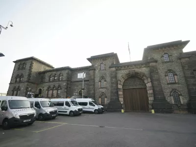 A general view of HMP Wandsworth in London where a British soldier awaiting trial on terror-related charges has escaped from a prison in southwest London Wednesday, Sept. 6, 2023 and police have launched an urgent manhunt. Counterterror police say Daniel Abed Khalife went missing from Wandsworth Prison early Wednesday. (Yui Mok/PA via AP)