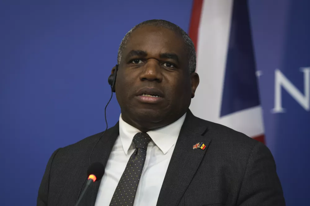 Britain's Foreign Secretary David Lammy speaks during a joint press conference with Moldova's Foreign Minister Mihai Popsoi and Romanian Foreign Minister Luminita Odobescu, in Chisinau, Moldova, Wednesday, Nov. 20, 2024. (AP Photo/Aurel Obreja)